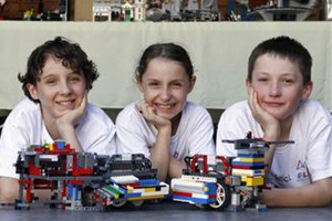 Elliot Boswell, 12, Jemima Boswell, 10, and Isaac Clark, 11, of Project Bucephalus with their Lego robots.  Picture: ANDY ZAKELI